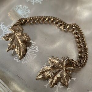 Gold leaf Mid Century Modern design sweater clip holds cardigan over shoulders